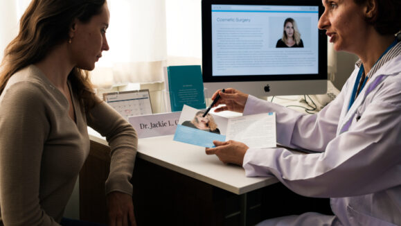 A Doctor With Her Patient