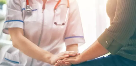 Female,Patient,Listening,To,Doctor,In,Medical,Office.