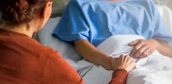 patient in hospital bed