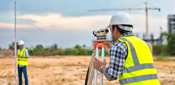 Site engineer doing measurements